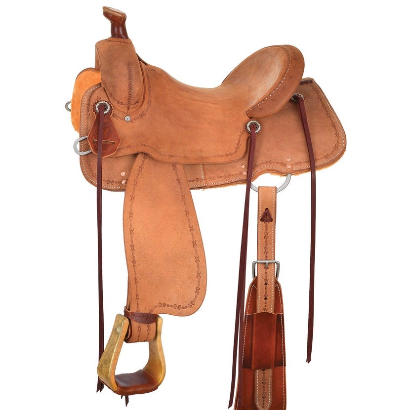 A light brown suede all around saddle with a back cinch and barbed wire tooling pattern. 